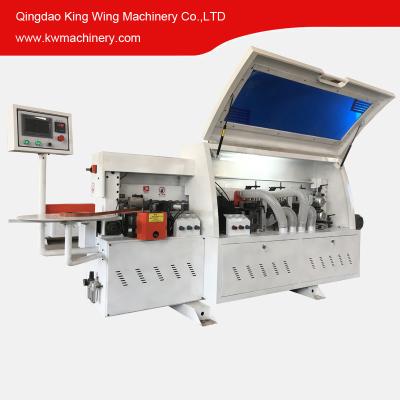 Cina Cheap automatic edge banding machine for cabinet in vendita