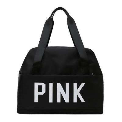 China Large Capacity Durable Duffle Bag Low Price Luggage Handbag Gym Casual Pink Tote Travel Shoulder Bag for sale