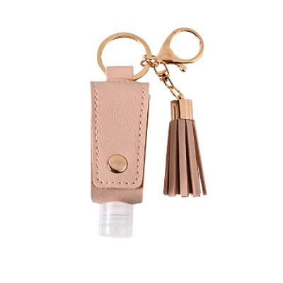 China High Quality New Arrival Tassel Key Chain PU PORTABLE Leather Hand Sanitizer Leather Case Pendant For Unisex for sale