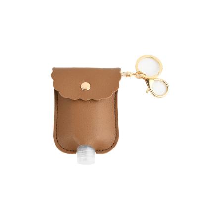 China Daily Use Factory Direct OEM Wholesale Portable Key Chain With Bottle Women Handbags Handbags Hand Sanitizer Holder Key Chain For Girls for sale