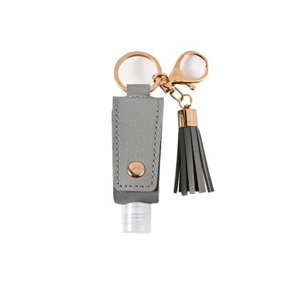 China New Arrival High Quality Tassel Key Chain PU Leather Hand Sanitizer Durable Leather Case For Unisex for sale