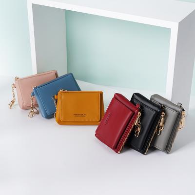 China No Zipper Unisex PU Leather Card Holder Coin Clips Clear RFID Shorts Wallet Men Women Credit Card Holder for sale