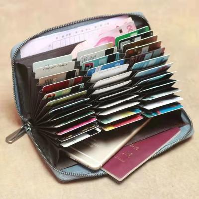 China 2021 RFID Wallet Large Capacity Card Holder Genuine Leather Wallet Long For Women Men RIFD Blocking ID Credit Name Cards Case for sale