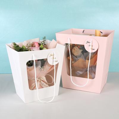 China Flower Recyclable Wholesale Trapezoidal Window Bag Packaging Bag Gift Open Transparent Paper Bag for sale