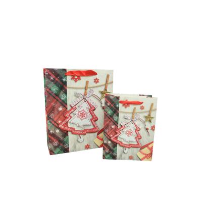 China Small Recyclable Candy Wine Luxury Christmas Celebration Craft Pattern Design Christmas Gift Bag for sale