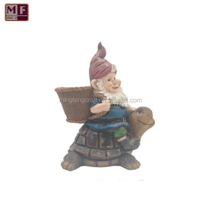 China Gnome Statue Garden Gnome With Basket Sitting On Turtle Outdoor Sheer Garden Figurine for sale