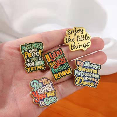 China Global Vintage Words Badge Pin Custom Logo Metal Alloy English Lapel Pins Badges Bulk Sale for sale