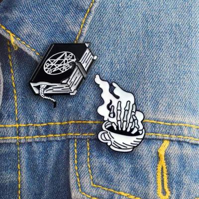 China Global Punk Style Witch Lapel Pins Insignia Metal Drop Magic Black Oil Book Coffee Mug Lapel Pin Custom for sale