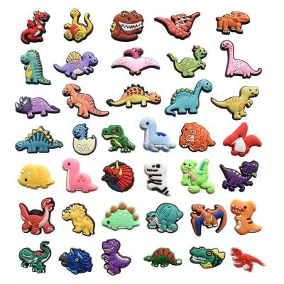 China Clog Charm 2022 New Cute Dinosaur Series Shoe Decoration Charms Soft PVC Cartoon Clog She Charm Supplier for sale