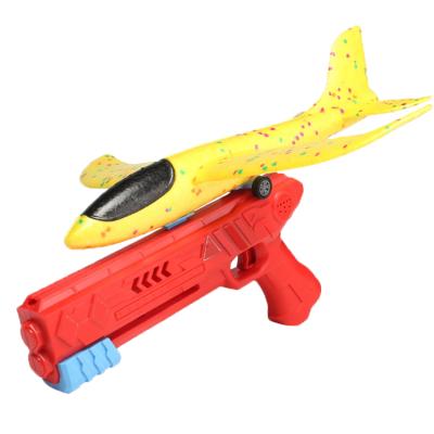 China Airplane Launcher Gun Outdoor Sport Airplane Game Shooting Toys Foam Catapult Gun With Plane for sale