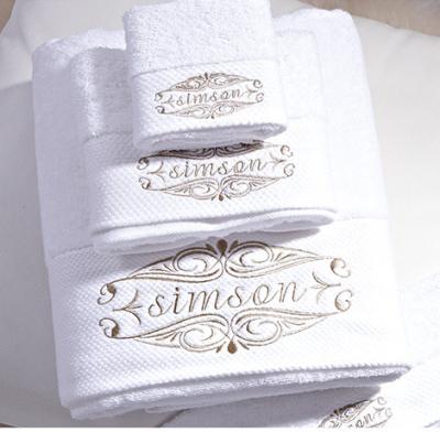 China White Compressed Cotton Hotel Face Towel With Embroidery for sale