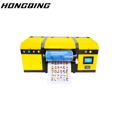 China Home Use A3 enterprise uses DTF coil gold stamping crystal label sticker 30cm wide xp600 transfer sticker UV printer for sale