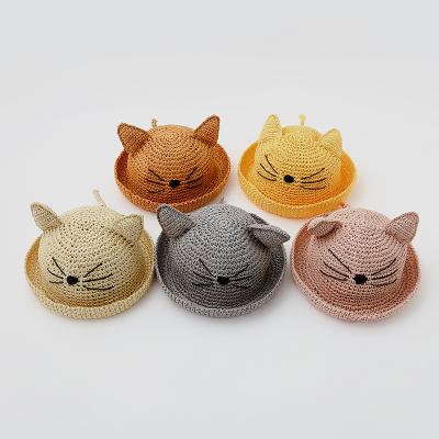 China Comfotable Fashion Summer Wholesale Hand - Woven Cat Sunshade Baby Fisherman Cute Straw Rattan Roll Up Sun Bucket Hat Hats for sale