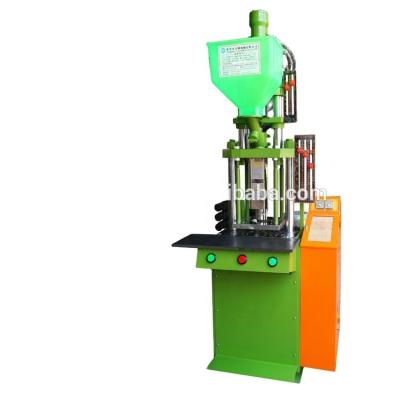 China VERTICAL 15T Vertical Hydraulic Injection Molding Machine For Making Usb Cables for sale