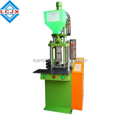 China Mini Standard 15ton VERTICAL Vertical Plastic Injection Molding Machine for sale