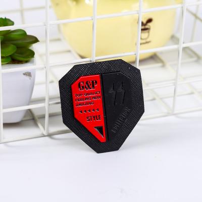 China Sustainable Manufacturers direct selling hardware trademark alloy stereoscopic embroidery logo coat alloy embroidered leather label for sale