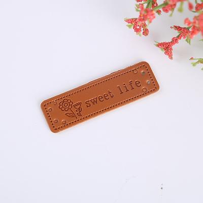 China Sustainable 1000 PCS Custom Faux PU Genuine Emboss Colorful Printing Logo Leather Hat Patch Leather Label For Clothing for sale