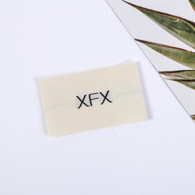 China Sustainable Deepking printing laser cut sewn t shirt label recycled custom garment woven fabric labels for sale