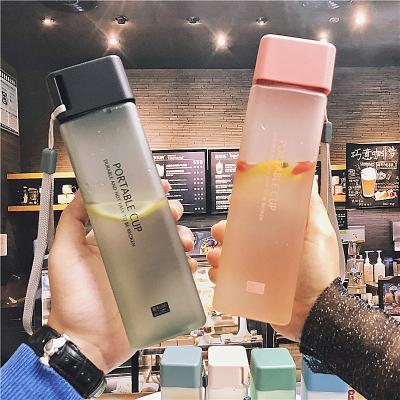 China Durable Transparent Matte Cup Juice Milk Cold Outdoor Portable Square Water Travel Sports Plastic Bottles With Rope for sale