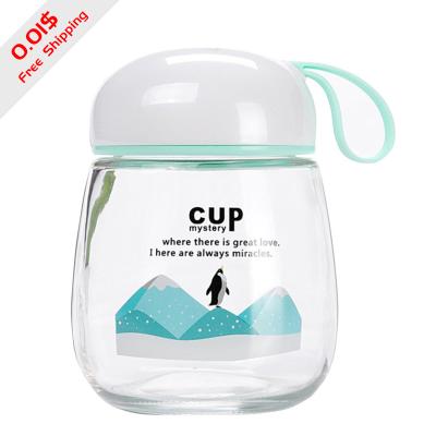 China Creative Cute Viable Water Portable Home Use Glass Mug Cup Doodle Cartoon With Silicone Rope Tumbler With Silicone Rope for sale