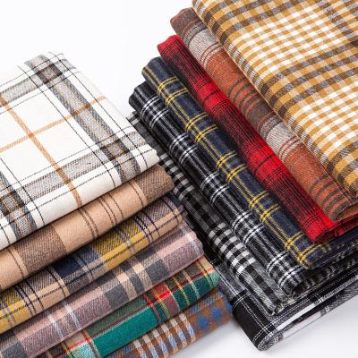 China Breathable Brushed Plaid Shirt Fabrics Cotton Polyesters Yarn Dyed Flannel Fabric For Shirts Dress Pants for sale