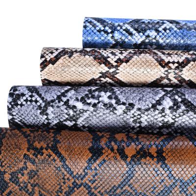 China Wholesale PVC Snake Waterproof Artificial Faux Grain Leather Fabric For Bags Shoes for sale