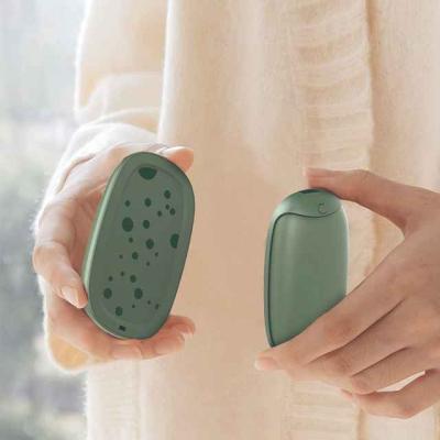 China Handy Power Bank 2021 USB Hand Warmer Power Bank Heater Reusable Rechargeable Separable Hand Warmer for sale