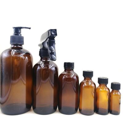 China Custom Personal Care 15ml 30ml 60ml 120ml 250ml 500ml Glass Boston Round Bottle With Lotion Pump for sale