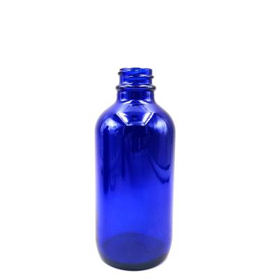 China Cheap Personal Care 2oz 60ml Amber Clear Blue Boston Round Glass Bottle For Pharmaceuticals for sale