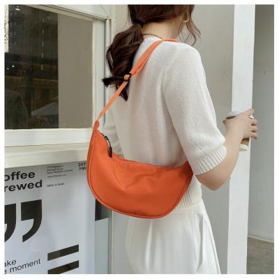 China New Fashion Youth Zipper Dumpling Bag Light Weight One Shoulder Hot Selling Cross - Body Bag Nylon Material Small Cross - Body Bag for sale