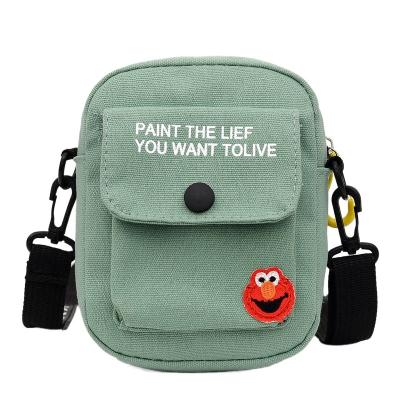 China Fashion Girl New Celebrity Canvas Schoolbag Net Korean Version Portable Net Korean Version Cartoon Soft Ins Cross - Body Bag Student Canvas Bag Small for sale