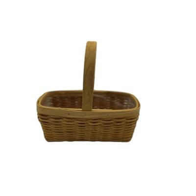 China Small Viable Waterproof Rattan Hand Held Pastoral Flower Arrangement Basket Flower Basket for sale