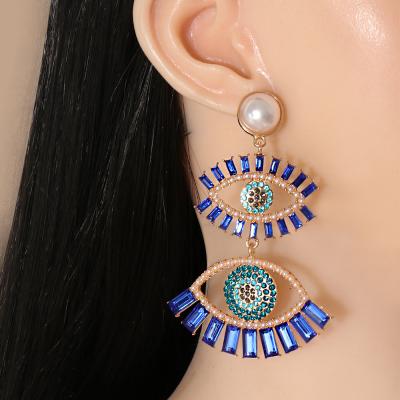 China New Fashionable French Style Low Moq Devil's Eye Colorful Earrings Good Price Female Personality for sale