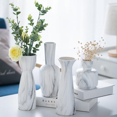 Cina Nordic modern creative marbling simple ceramic flower arrangement living room home furnishings CIA flower vase in vendita