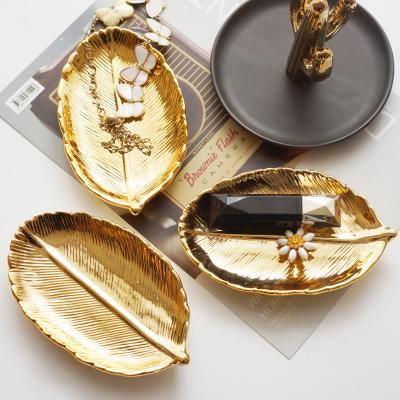 China Wholesale Home Decoration Porcelain Table Tops Ceramic Leaf Jewelry Storage Gold Tray for sale