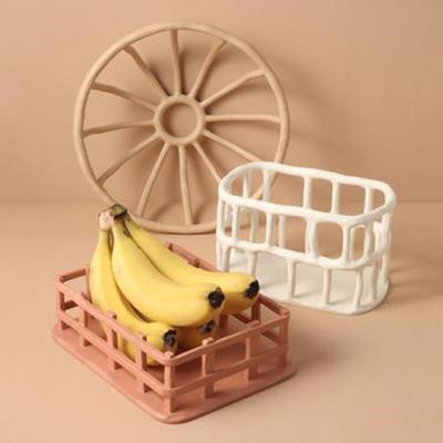 China Nordic Creative China Central Statistical Institute Style Morandi Fruit Dish Cavity Storage Resin Opens Home Decor for sale