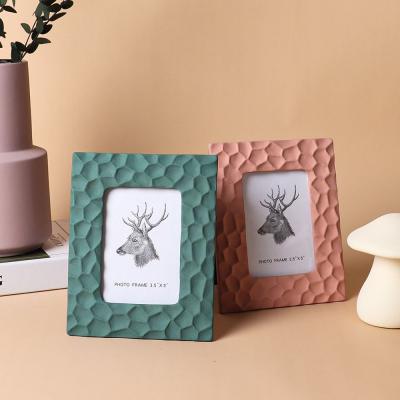 China New Arrival Style Modern Luxury Ceramic Photo Frame Props Table Home Decorations for sale