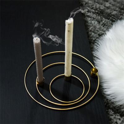 China 100% Handmade Modern Gold Candle Holder Metal Table Decor Party Light Luxury Candlesticks for sale