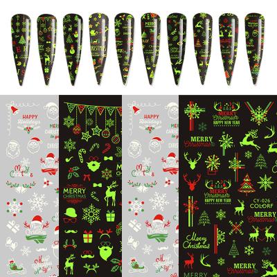 China Exquisite Custom Nail Art Luminous Christmas Sticker Diy Living Room Effect Glow Nail Snowman Stickers for sale