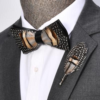 China New Fashion Style Feather Style Casual Men's Suits Accessories Handmade Bow Tie And Brooch Set for sale