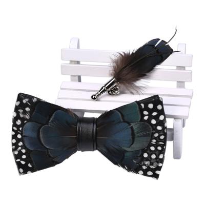 China Feather Style Stretching Products Men's Suits Accessories Sets Luxury Butterfly Feather Leather Bow Tie Men for sale