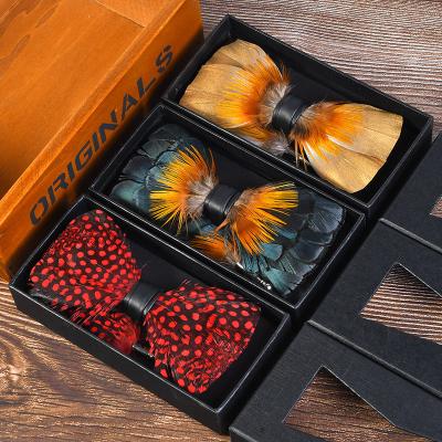 China Feather style men's accessories Bowtie Breastpin Handmade Feather Bow link and brooch luxury set for men for sale