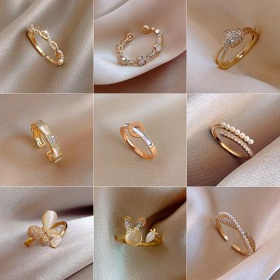 China TRENDY New twisted designer simple finger ring rabbit butterfly fishtail gold plated pearl zircon opal turquoise opened rings for sale