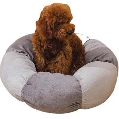 China New Design 2022 Sustainable Machine Washable Mixed Color Round Soft Warm Cat Dog Bed Heated Pet Bed Anti Slip for sale