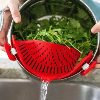 China Stocked Adjustable Silicone Clip On Strainer For Pots Filters And Rolls Kitchen Colander for sale