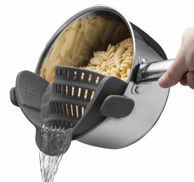 China Hot Instant Colander Heat Resistant Food Colander Heat Resistant Side Sticker Pot Drain Clip Sieve Silicone Stocked Removable Strainer for sale