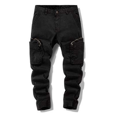 China EXROTOY Anti-wrinkle Cargo Pants Washed Outdoor Sports Tactical Military Big Pockets Tie Foot Pants Trousers for sale