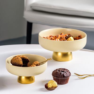 China Diseño moderno lujoso postre soporte para frutas secas y porcelana plato de postre en venta