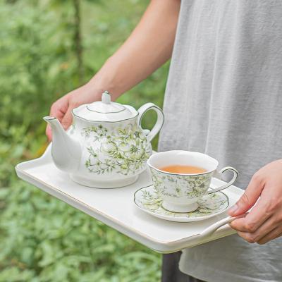 China Tipos de vasos para bebidas platillos estilo de diseño vasos para cenar flores vasos de cerámica conjunto de vasos de café y té conjuntos de porcelana tetera taza conjunto de regalo caja Europa lujoso set de té para el tiempo de té elegante en venta