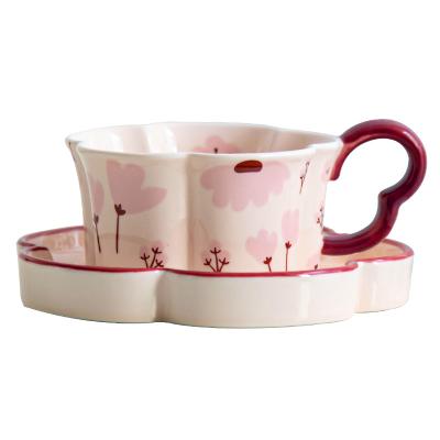 China 210 ml de volumen estilo fresco exquisita en forma de flor Tazas y platillos para el café final en venta